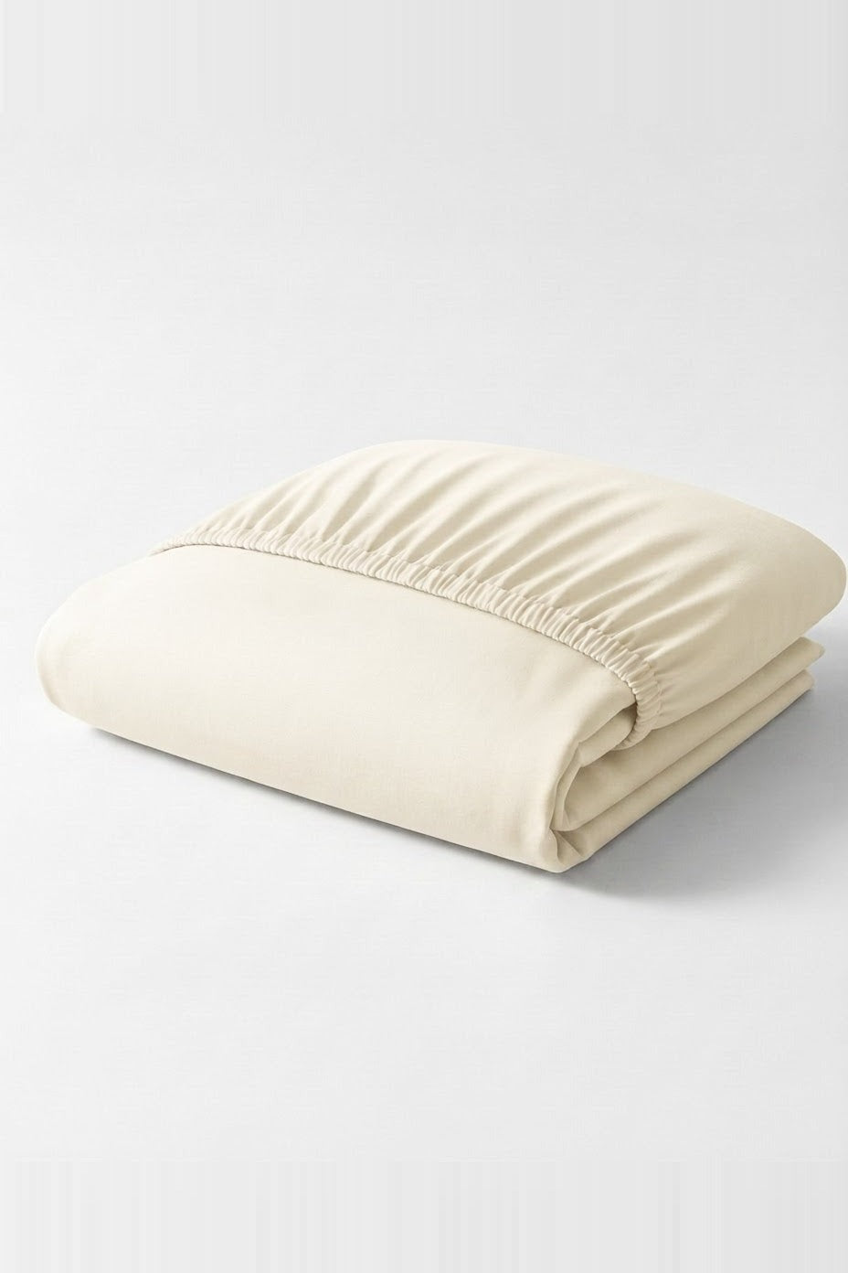 Izy Lenzuolo Inferiore Naturale - lenzuolo con angoli in percalle di cotone panna piegato su sfondo bianco